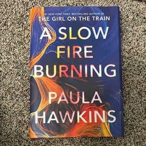 A slow fire burning by Paula Hawkins book